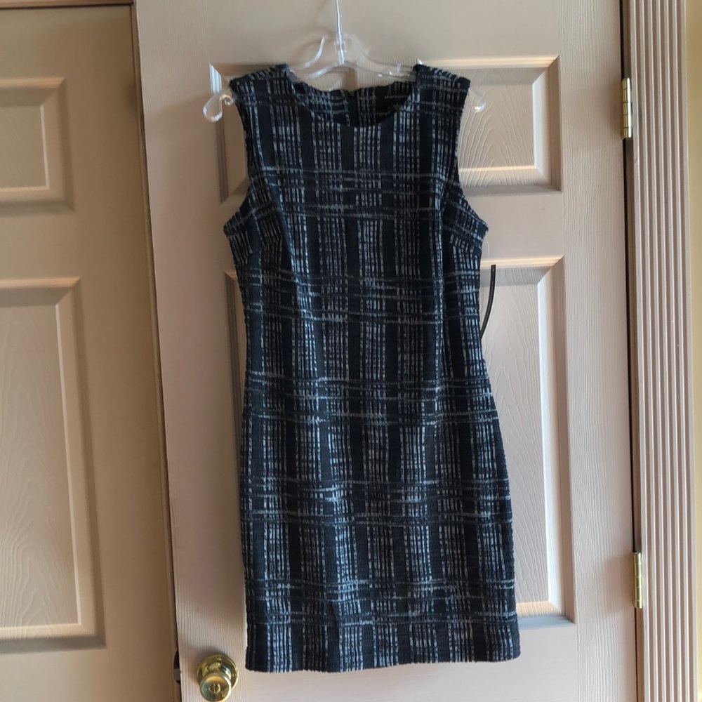 Black snug fit polyester, cotton, and spandex